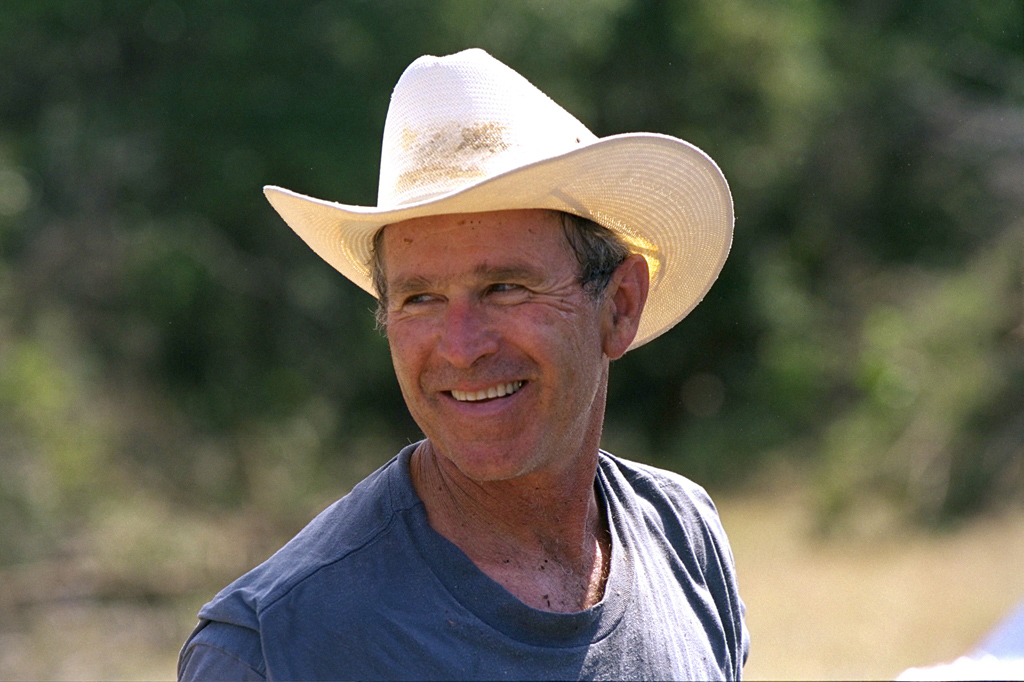 President George W. Bush at work clearing brush, August 28, 2002, at Prairie Chapel Ranch in Crawford, Texas.  (P20914-13)