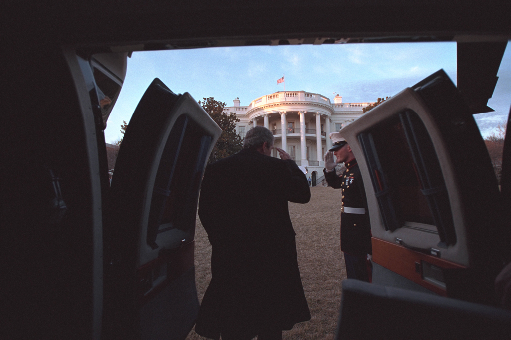 President George W. Bush salutes, February 4, 2001, as he disembarks Marine One on the South Lawn of the White House. (P336-07)