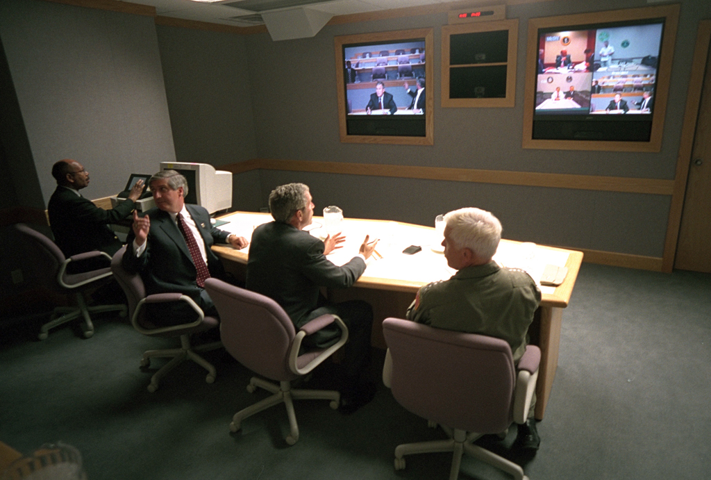 President George W. Bush, White House Chief of Staff Andy Card (left) and Admiral Richard Mies conduct a video teleconference, September 11, 2001, at Offutt Air Force Base in Nebraska. (P7093-16)