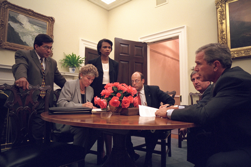 President George W. Bush immediately gathers his senior staff in the Private Dining Room, September 11, 2001, after returning to the White House. (P7111-27a)