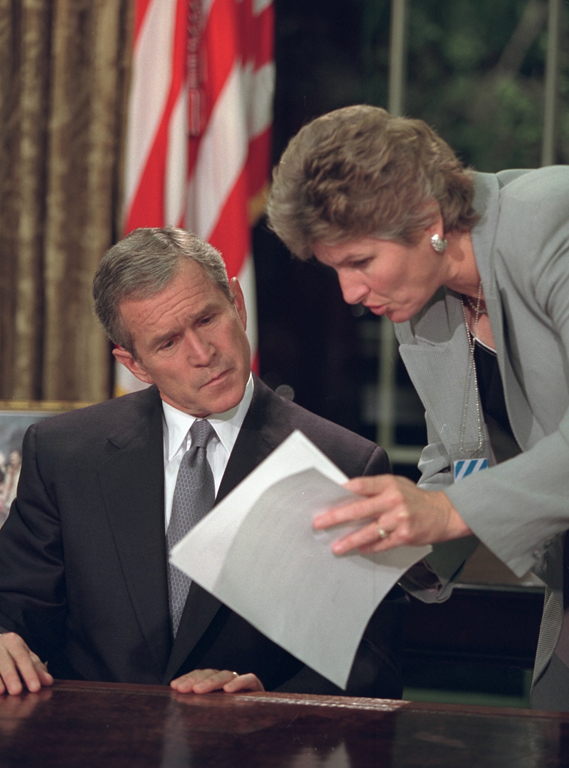 President George W. Bush reviews his statement with Karen Hughes, Counselor to the President, September 11, 2001, before addressing the nation from the Oval Office. (P7132-04)