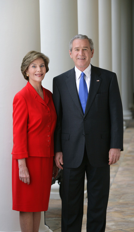 President George W. Bush and Mrs. Laura Bush pose for their official portrait, October 25, 2005, on the Colonnade of the White House. (P102505ED-0102)