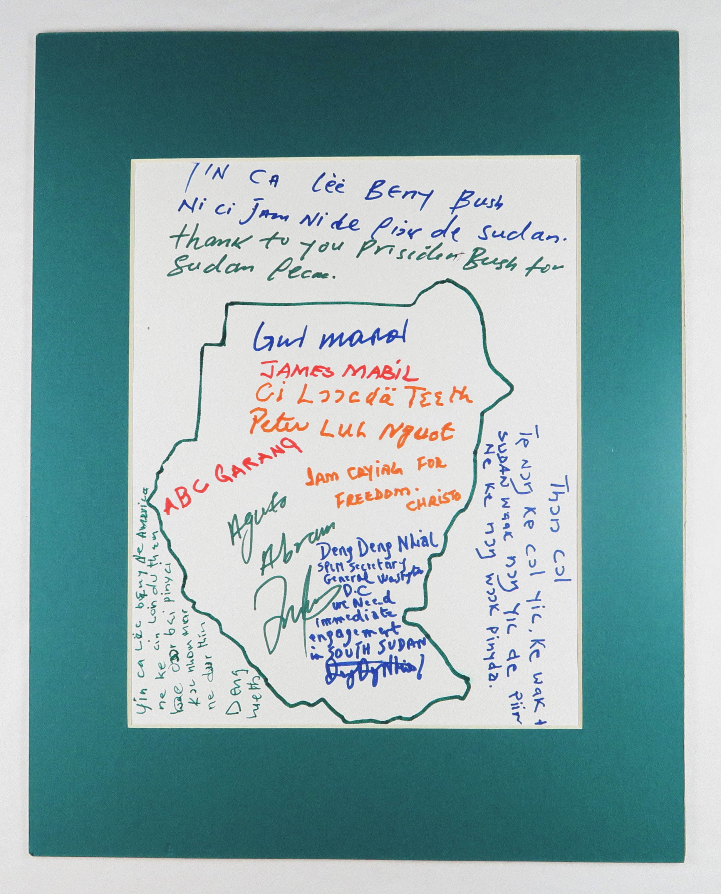 Drawing of Sudan with messages from gifters, Lost Boys of Sudan, Nashville, Tennessee. Presented to President Bush in the Roosevelt Room after his signing of the Sudan Peace Act (HR 5531) in October 2002.