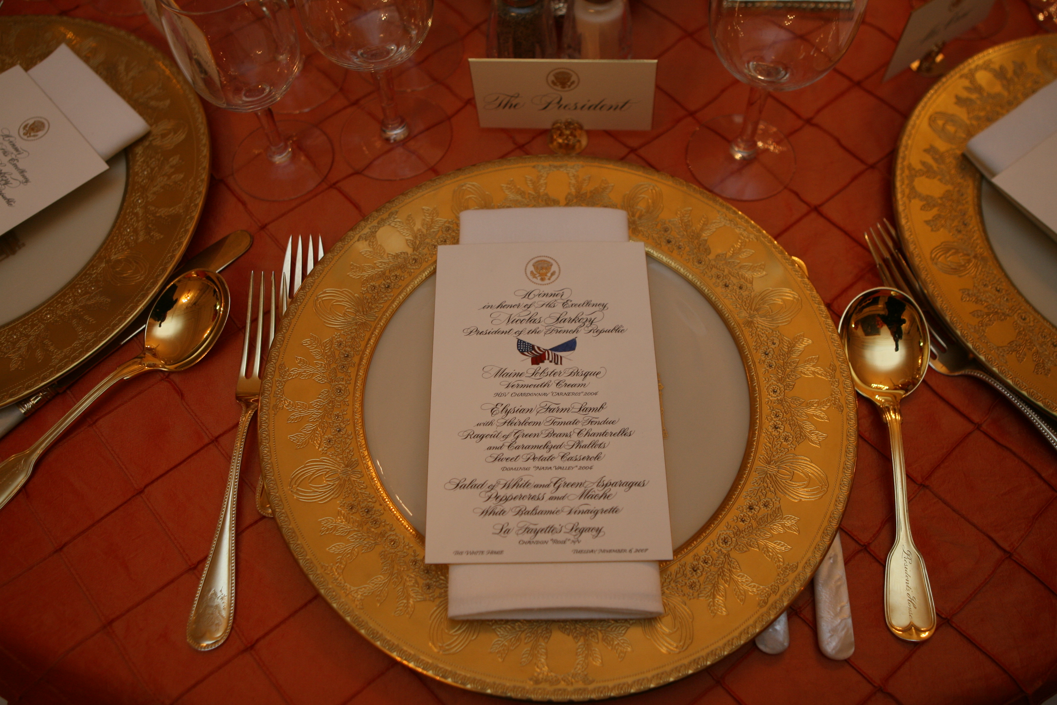 The dinner setting for President George W. Bush is seen, November 6, 2007, in the State Dining Room of the White House for the dinner in honor of French President Nicolas Sarkozy.