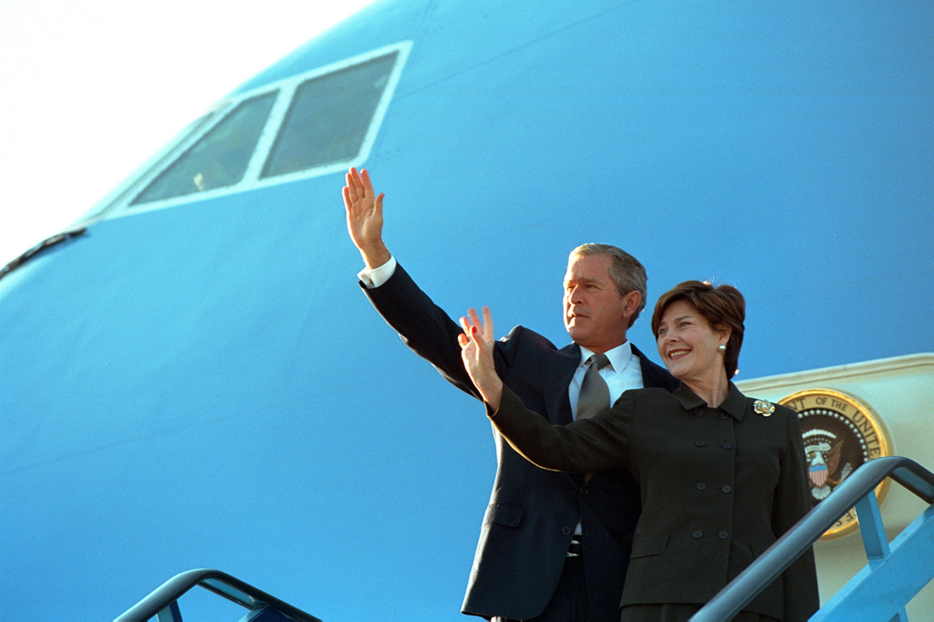 President George W. Bush and Mrs. Laura Bush wave before boarding Air Force One, June 13, 2001