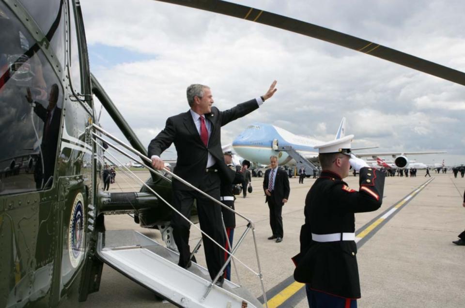 President George W. Bush Waves While Boarding Marine One at Heathrow International Airport in London on June 15, 2008.