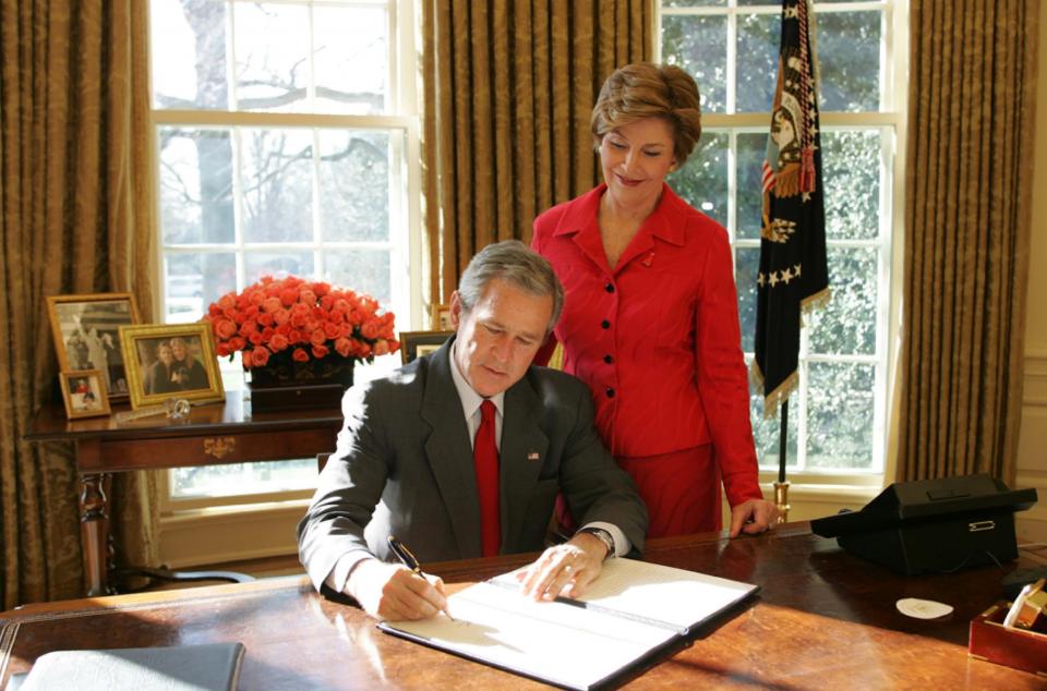 President George W. Bush Signs a Proclamation Designating February as American Heart Month in the Oval Office on February 1, 2005.