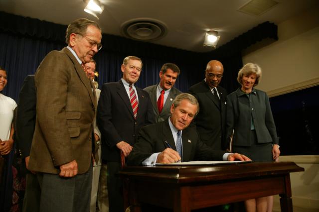 President George W. Bush signs into effect the Indian Education Executive Order during a signing ceremony, April 30, 2004, in the Old Executive Office Building. (P40117-10)