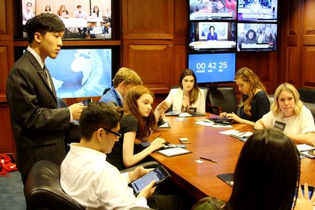 Students participate in the Situation Room Experience