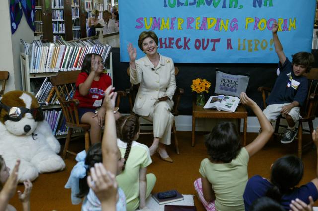 Laura Bush discusses the importance of reading with children participating in the No Child Left Behind Summer Reading Program at the Portsmouth Public Library in Portsmouth, New Hampshire, July 9, 2004.