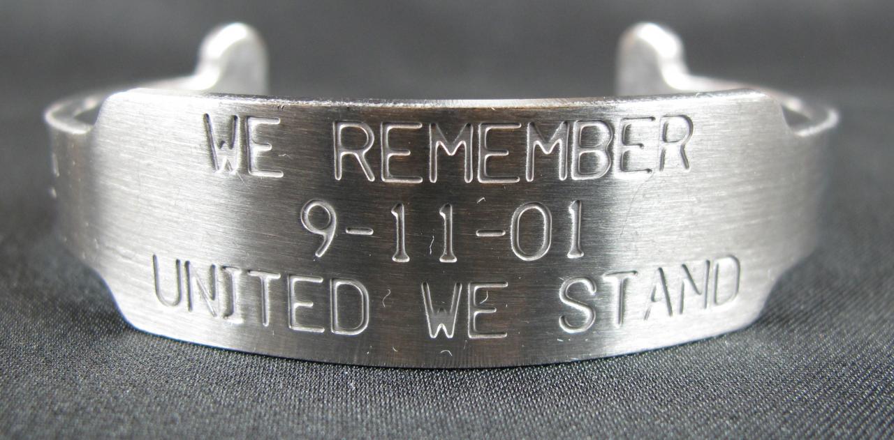 'Hearts of Steel,' bracelet engraved 'Let's Roll/ We Remember 9-11-01 United We Stand/ USA.'