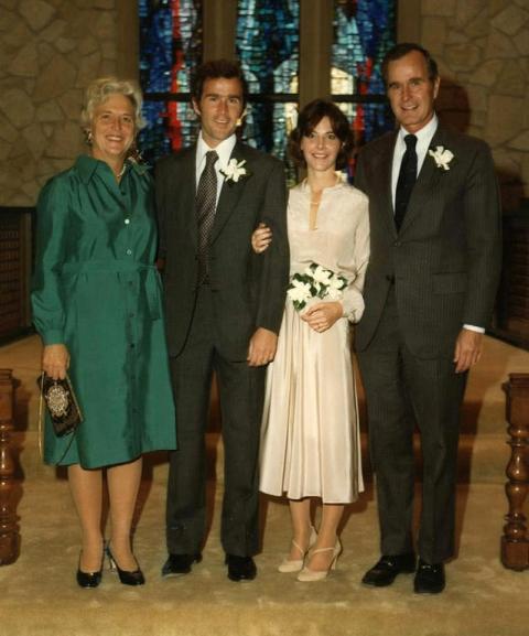 George W. Bush and Laura Bush at their wedding on November 5, 1977, with George H. W. Bush and Barbara Bush. (H37-01)