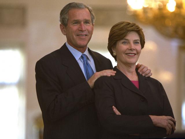 President George W. Bush and Mrs. Laura Bush pause during a tour of the Hermitage, May 25, 2002, in St. Petersburg, Russia. (P17847-31)