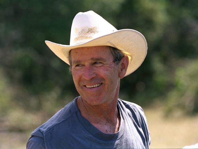 President George W. Bush at work clearing brush, August 28, 2002, at Prairie Chapel Ranch in Crawford, Texas.  (P20914-13)