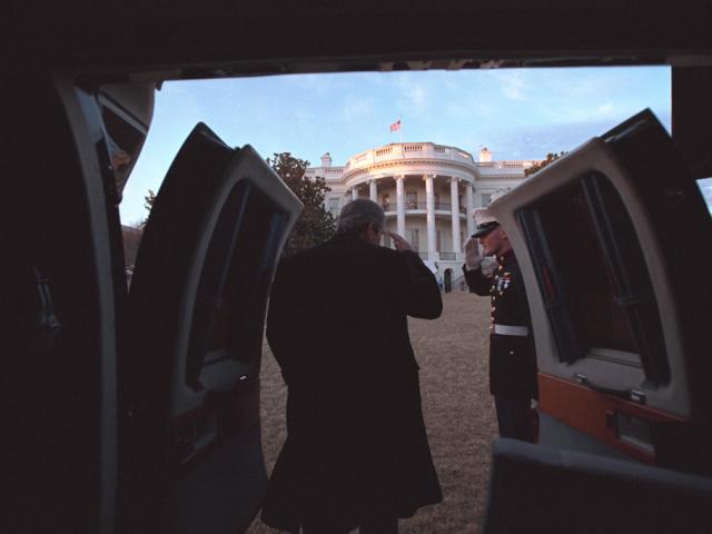 President George W. Bush salutes, February 4, 2001, as he disembarks Marine One on the South Lawn of the White House. (P336-07)