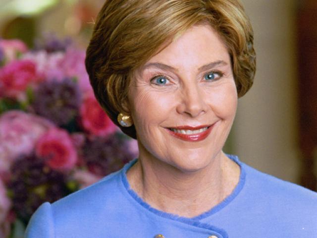 Mrs. Laura Bush sits for a photo, May 26, 2004, in the Green Room of the White House.  (P40987-22)