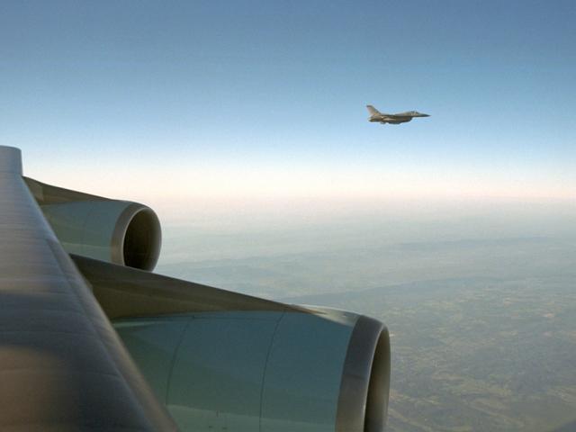 An F-16 escorts Air Force One, September 11, 2001, from Offutt Air Force Base in Nebraska to Andrews Air Force Base. (P7099-18)