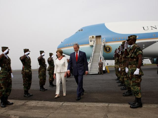 President George W. Bush and Mrs. Laura Bush arrive in Monrovia, Liberia, February 21, 2008.