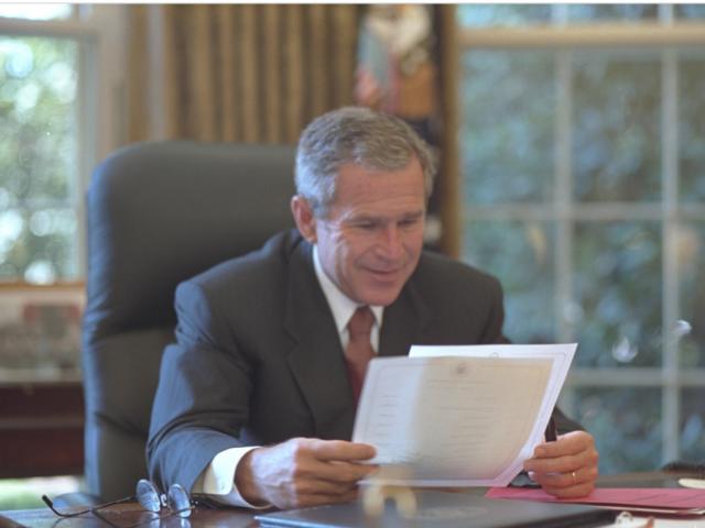 President Bush reviews his schedule on September 13, 2001