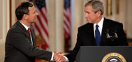 President George W. Bush shakes hands with Supreme Court Justice Nominee John Roberts after his remarks on the State Floor of the White House, July 19, 2005.
