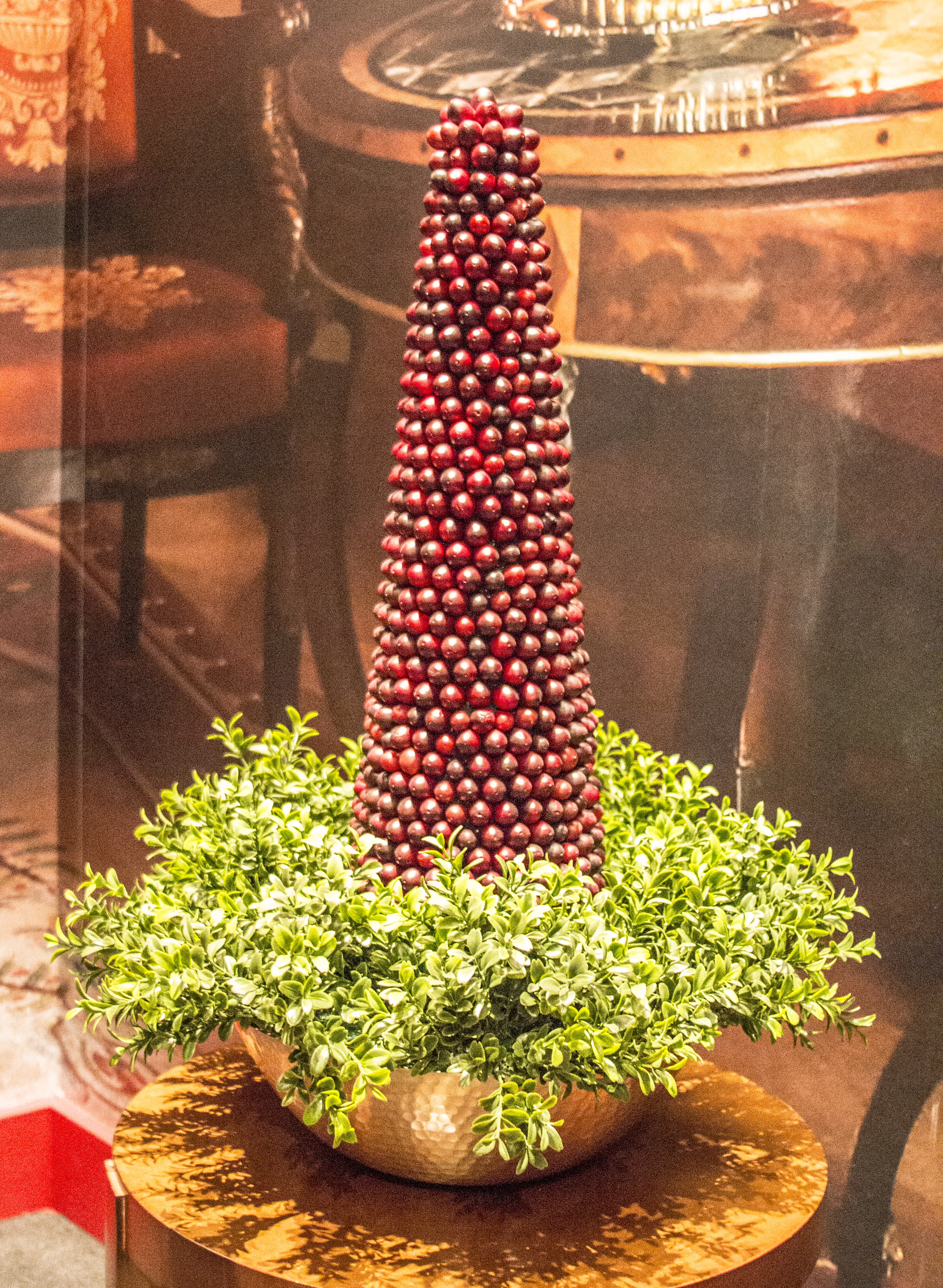 A picture of a cranberry holiday tree display, part of the 2017 Holiday exhibit at the George W Bush Library and Museum