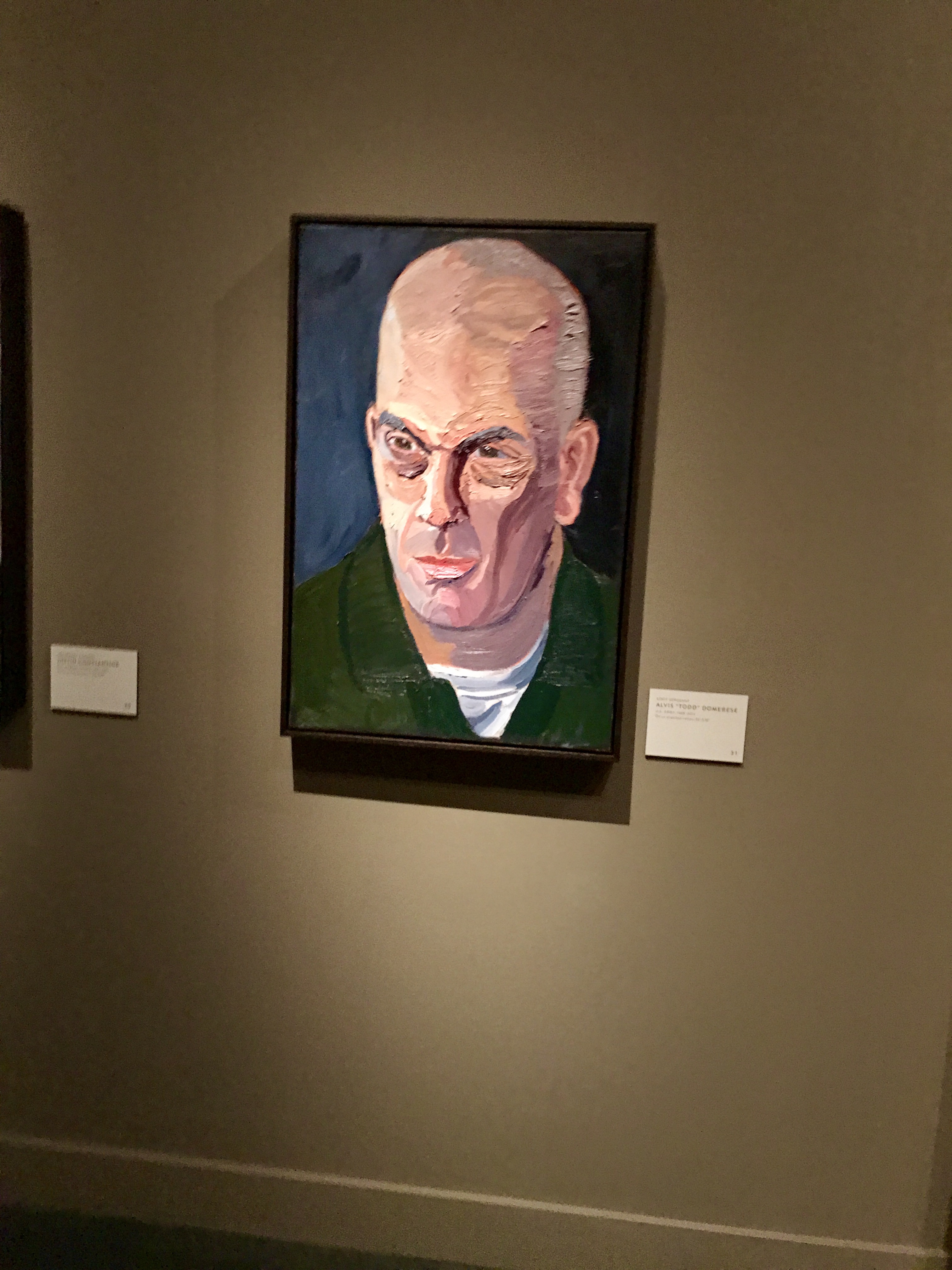 A photo of a portrait of David Haines by President George W Bush, part of the  2017 exhibit Portraits of Courage, at the George W Bush Library and Museum