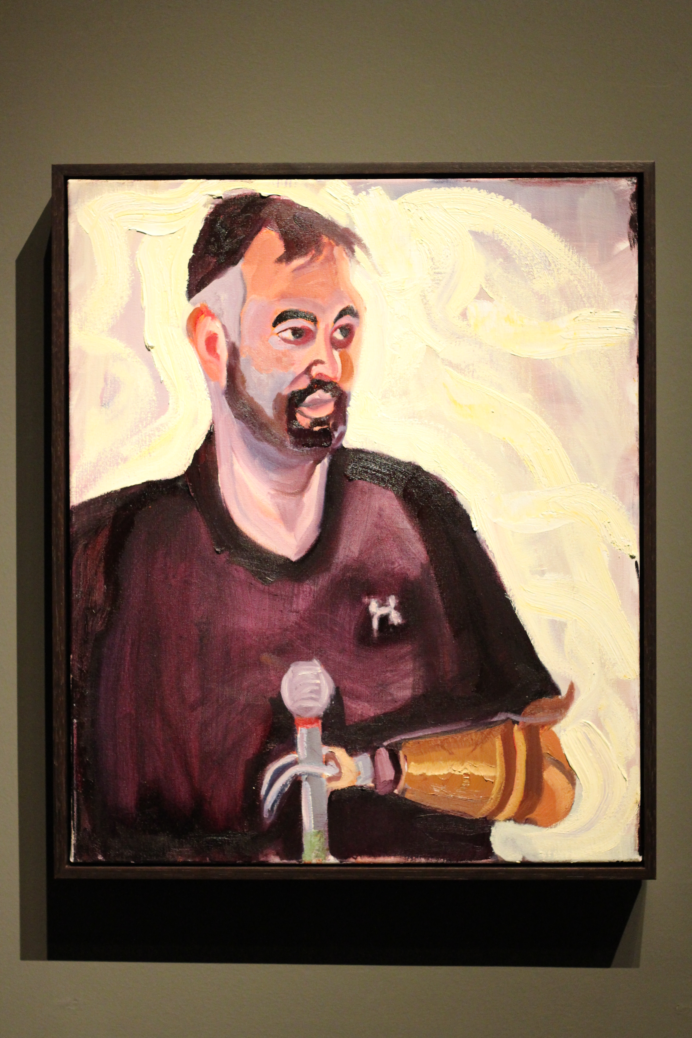 A picture of a portrait of Matthew DeWitt, part of the 2017 Portraits of Courage exhibit at the George W Bush Library and Museum.