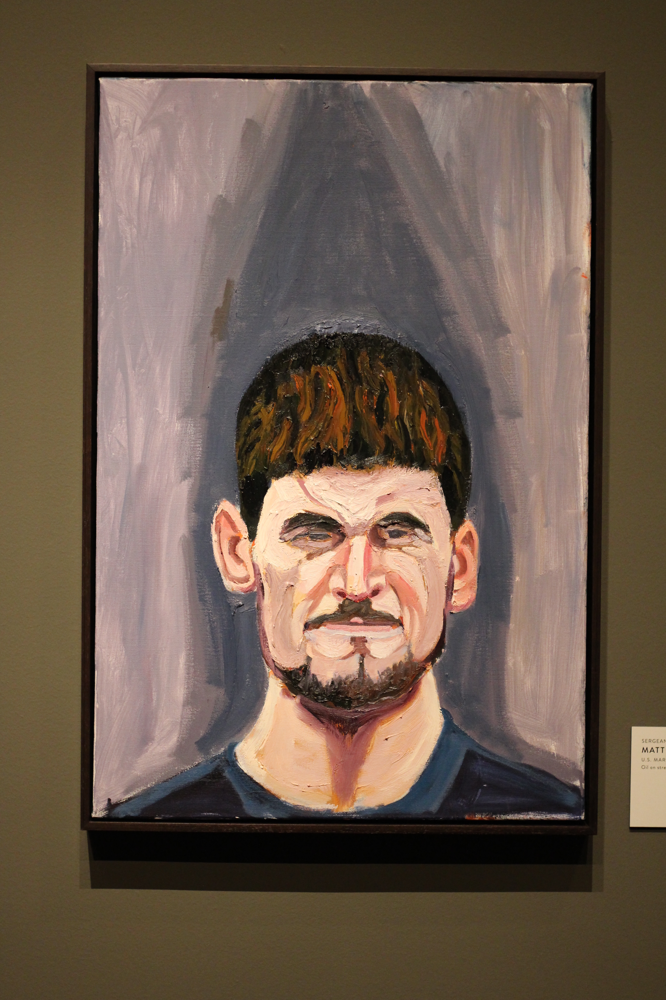 A photo of a portrait of Matthew Zbeic, part of the 2017 Portraits of Courage exhibit at the George W Bush Library and Museum.
