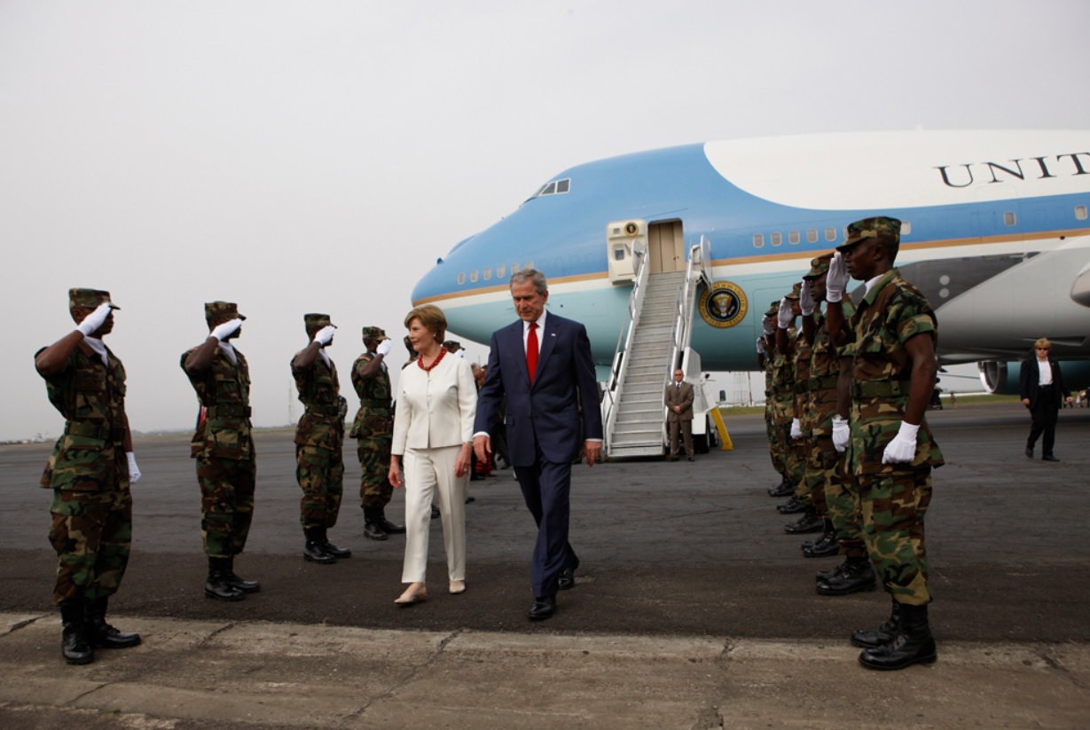 President George W. Bush and Mrs. Laura Bush arrive in Monrovia, Liberia, February 21, 2008.