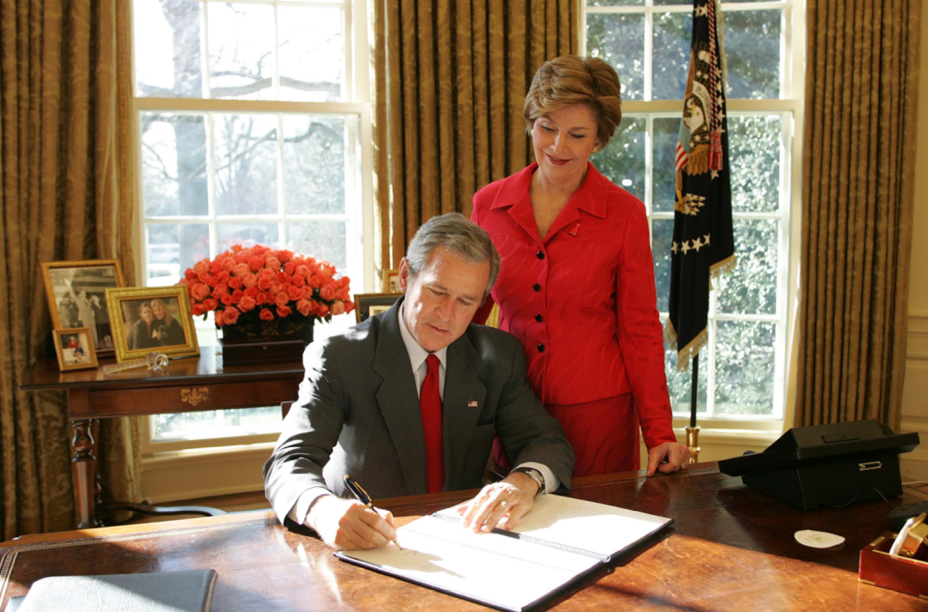 President George W. Bush Signs a Proclamation Designating February as American Heart Month in the Oval Office on February 1, 2005.