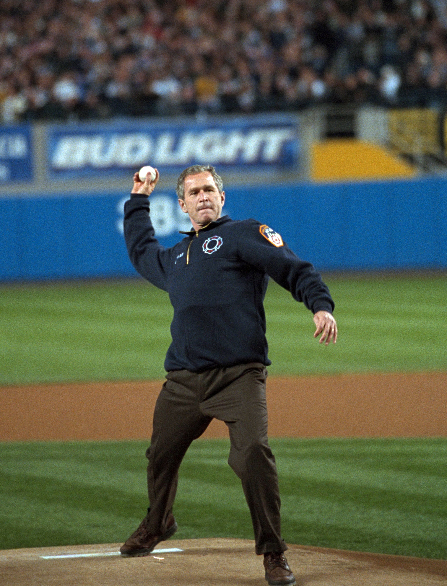 President George W. Bush throws out the ceremonial first pitch at Yankee Stadium before Game Three of the World Series between the Arizona Diamondbacks and the New York Yankees.