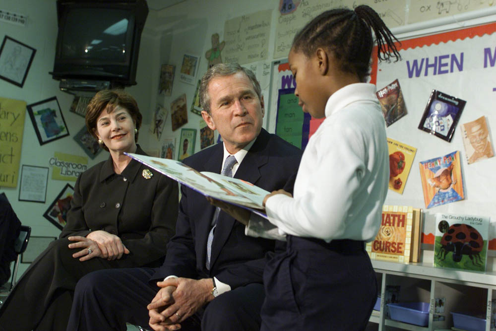 President George W. Bush and Mrs. Laura Bush Listen as Student Janea Bufford Reads Aloud at Moline Elementary School in St. Louis, Missouri