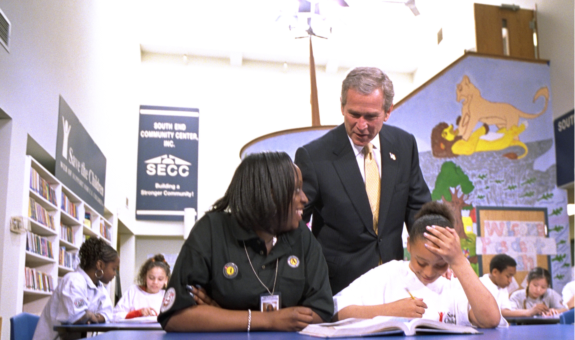 President Bush meets with volunteers and students after a speech about USA Freedom Corps