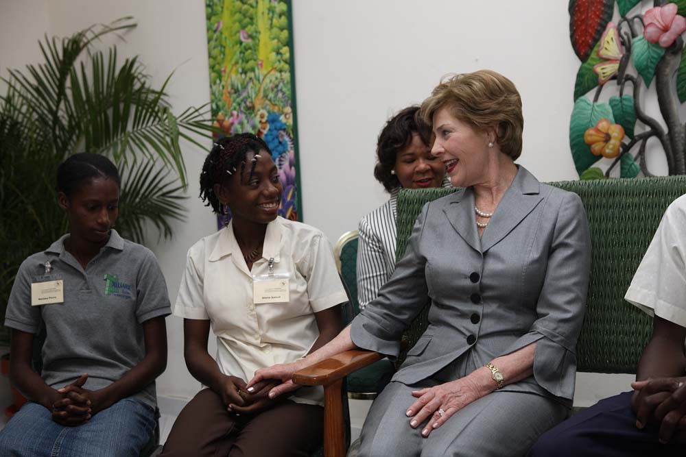 First Lady Laura Bush visits patients at the GHESKIO HIV/AIDS Center in Port-au-Prince, Haiti, in 2008.