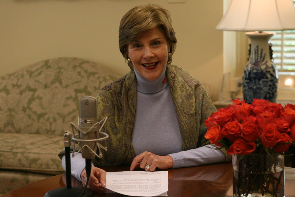 First Lady Laura Bush records the Weekly Radio Address from her study in January 2008. (P013008SC-0374)