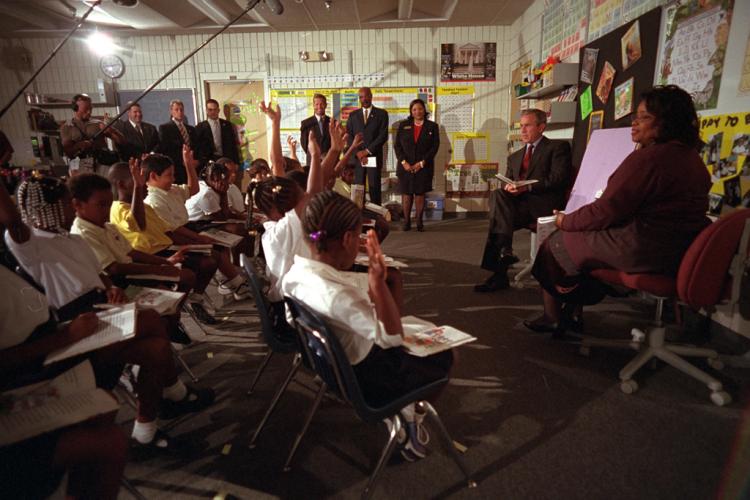 President George W. Bush participates in a reading demonstration the morning of September 11, 2001, at Emma E. Booker Elementary School in Sarasota, Florida. (P7060-19A)