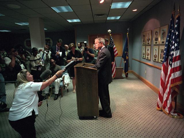 President George W. Bush delivers remarks on the terrorist attacks, September 11, 2001, from Barksdale Air Force Base in Louisiana, before departing for Offutt Air Force Base in Nebraska. (P7078-04)
