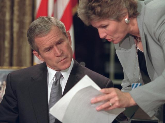 President George W. Bush reviews his statement with Karen Hughes, Counselor to the President, September 11, 2001, before addressing the nation from the Oval Office. (P7132-04)