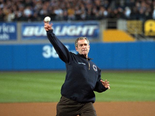 President George W. Bush throws out the ceremonial first pitch, October 30, 2001, at Yankee Stadium before Game Three of the World Series. (P9154-14)