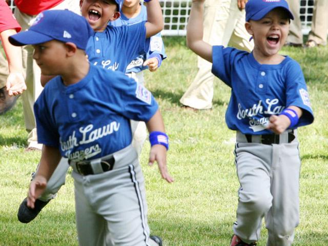 Players celebrate at the conclusion of the season opener game.