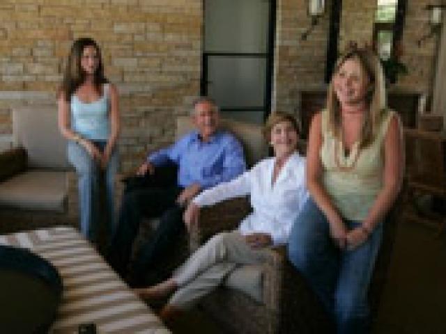 President George W. Bush and Mrs. Laura Bush relax with their daughters, Barbara and Jenna, August 24, 2004, during an interview for People Magazine at Prairie Chapel Ranch in Crawford, Texas. (P42733-170)