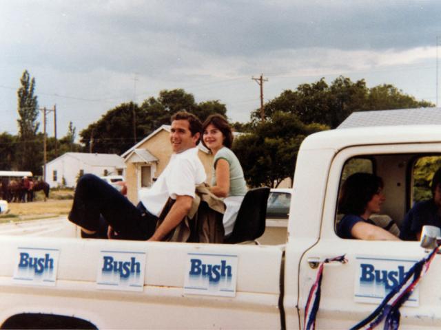George W. and Laura Bush campaigning from the back of a pickup truck for the 1978 Congressional race in West Texas. (H22-01)