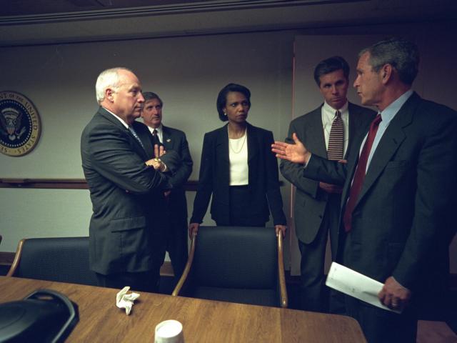 After returning to the White House, September 11, 2001, President George W. Bush meets with advisors in the Presidential Emergency Operations Center in the White House.