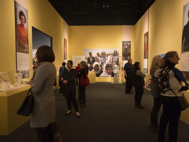 A picture of visitors looking at the displays in the 2018 First Ladies Exhibit at the George W Bush Library and Museum