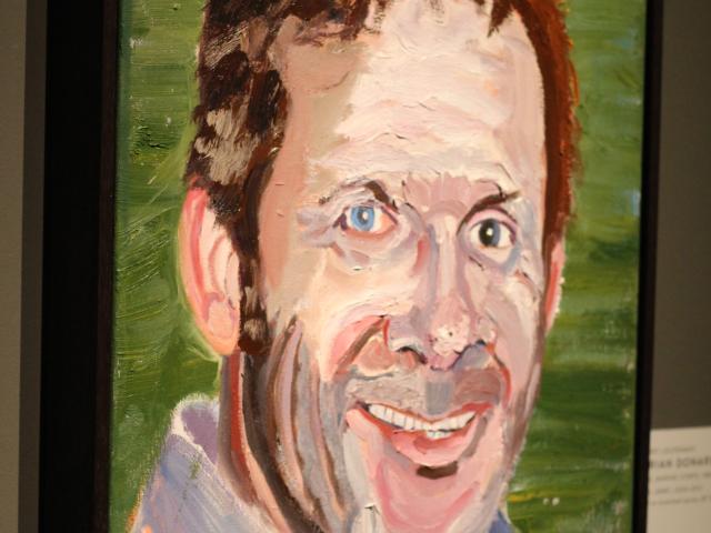 A photo of a portrait of Brian Donarski by President George W Bush, part of the 2017 exhibit Portraits of Courage, at the George W Bush Library and Museum