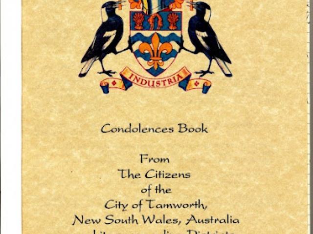 This photograph of a spread of condolence books sent in from Australia illustrates the abundance and variety of books sent in from throughout the world.