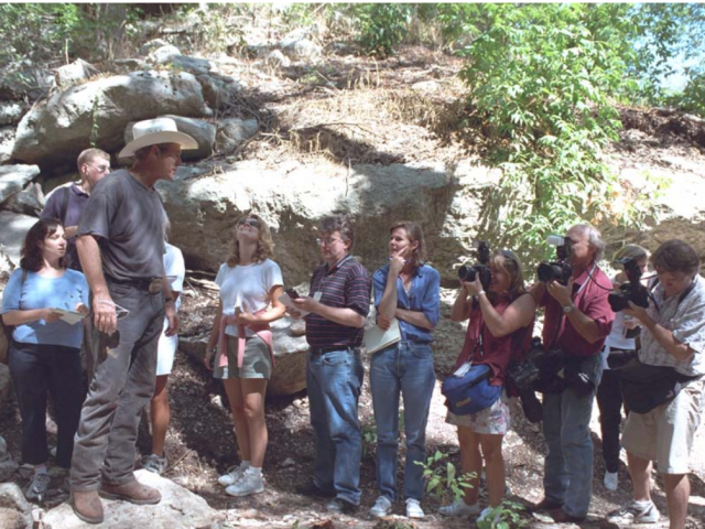 President Bush leads the White House Press Pool on a tour of his Crawford Ranch.