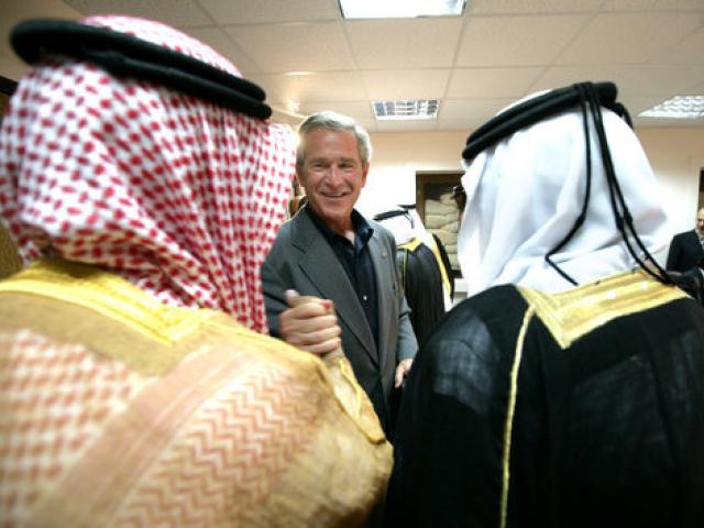 President George W. Bush greets local leaders of Al Anbar Province before their meeting at Al Asad Airbase, Al Anbar Province, Iraq, September 3, 2007.