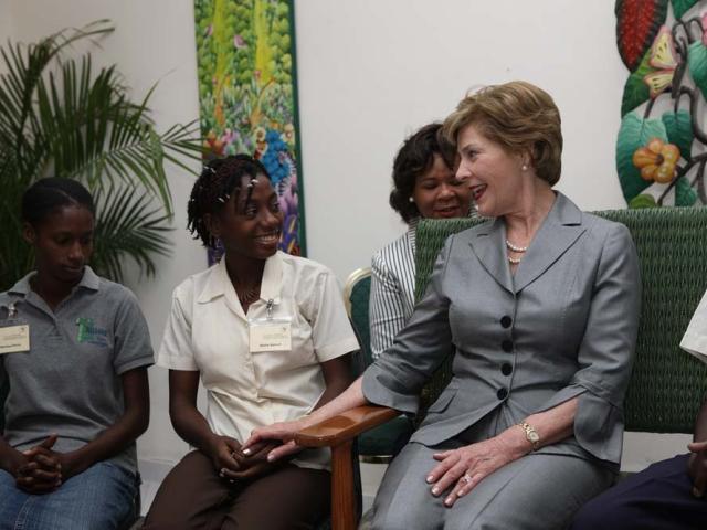 First Lady Laura Bush visits patients at the GHESKIO HIV/AIDS Center in Port-au-Prince, Haiti, in 2008.