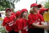 Members of the Luray, Virginia Red Wings watch from the bench.